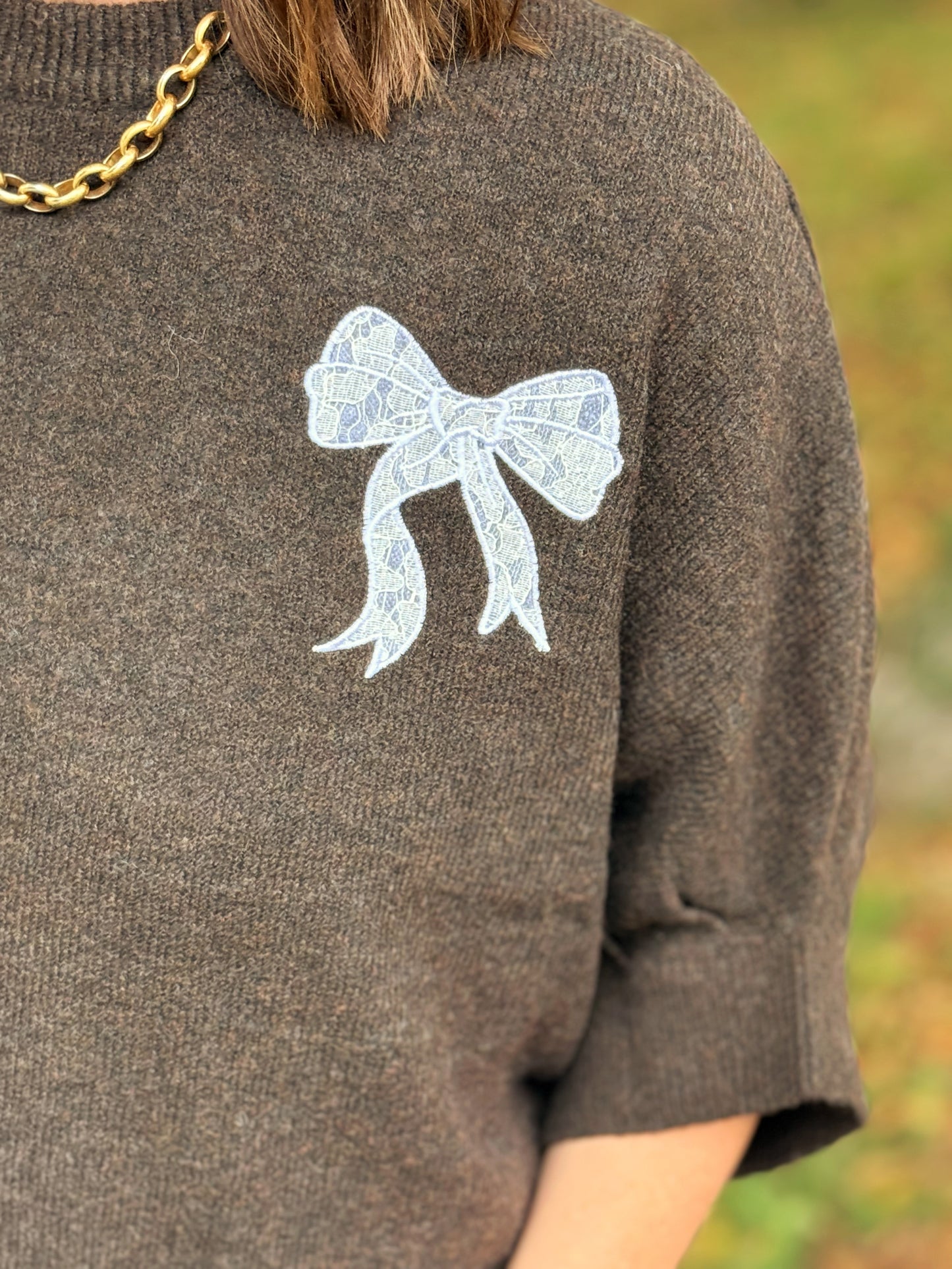 Kuschelpullover mit Schleife - Schokobraun