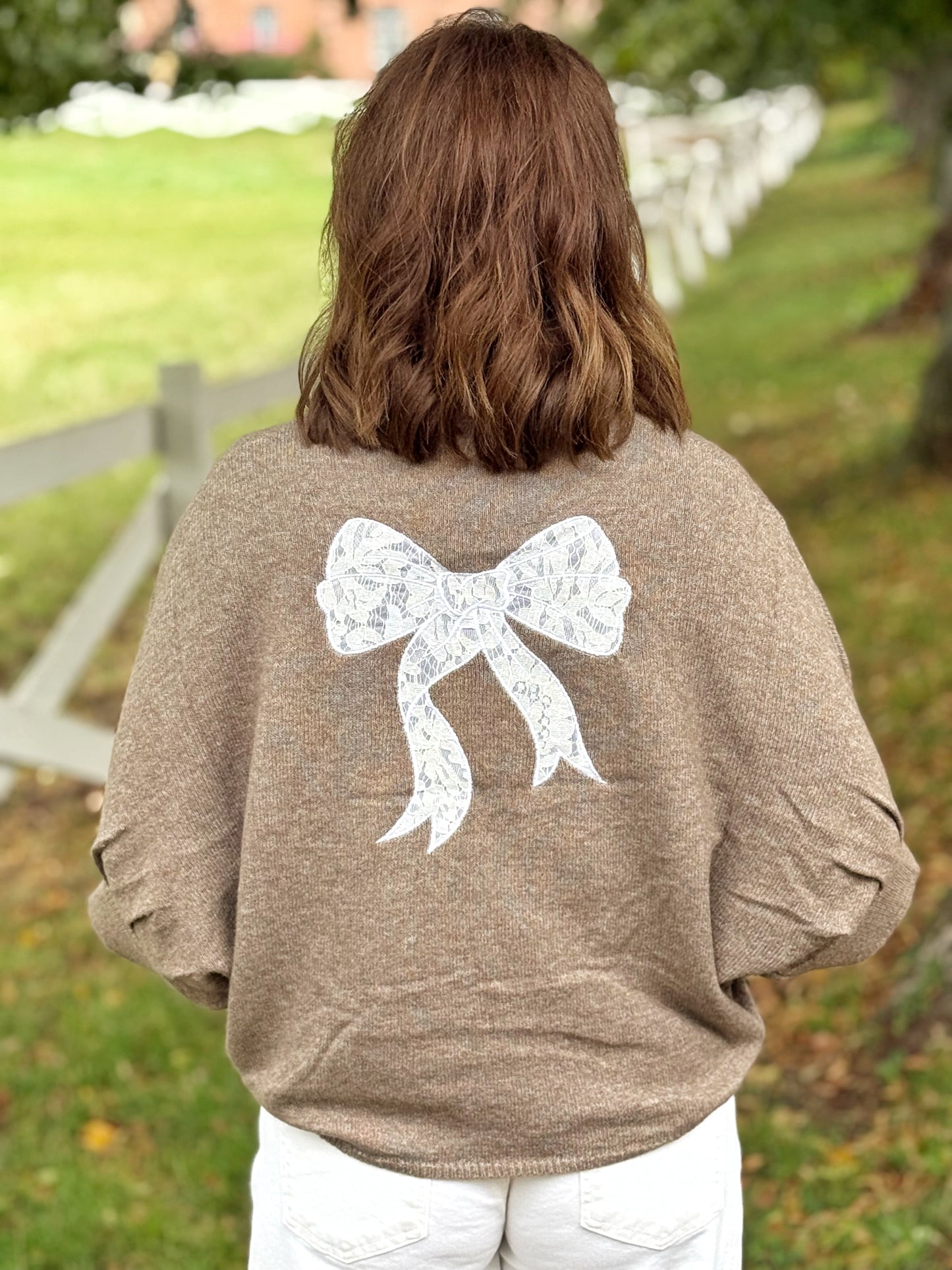 Kuschelpullover mit Schleife - Haselnussbraun