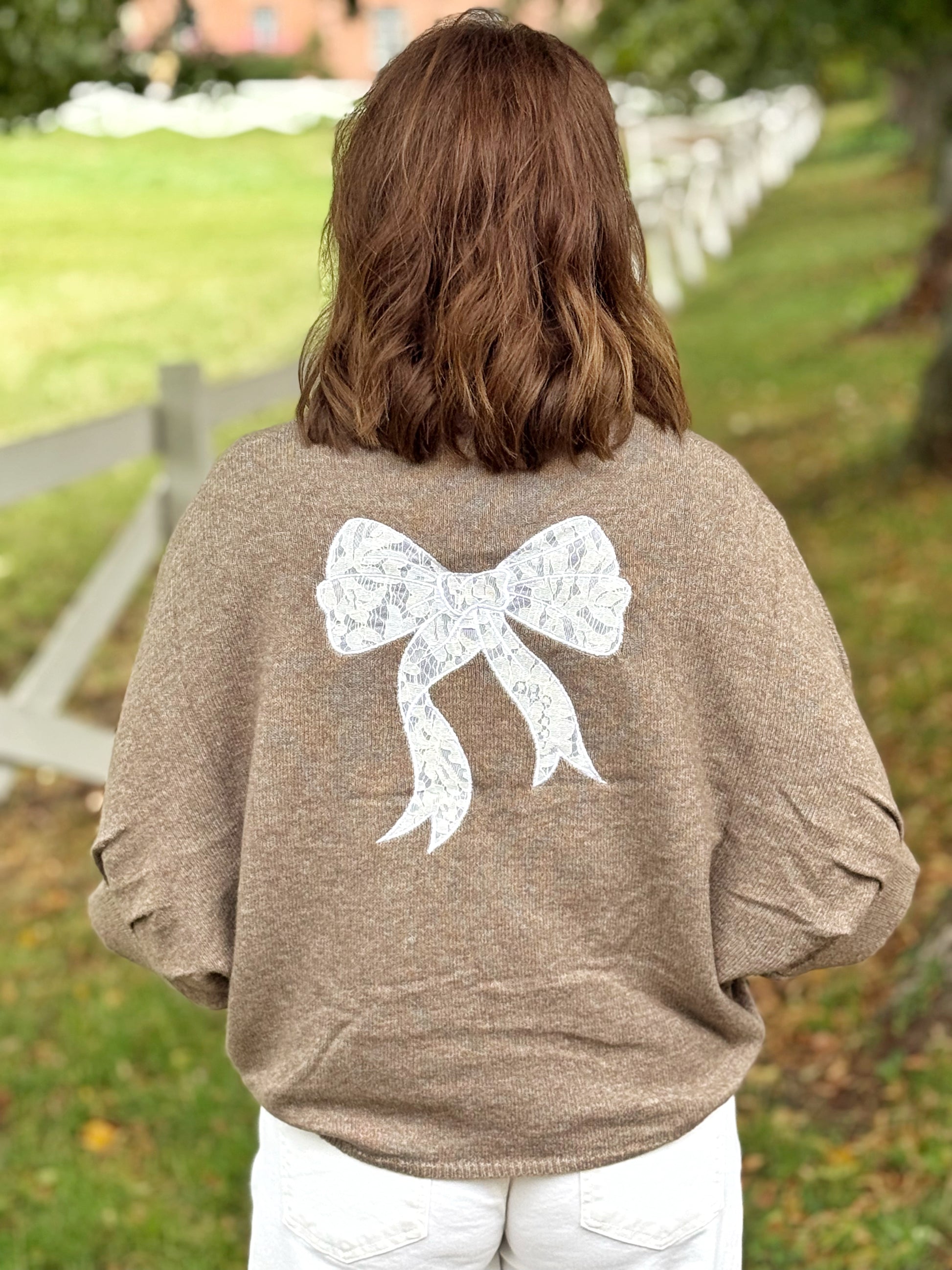 Kuschelpullover mit Schleife - Haselnussbraun