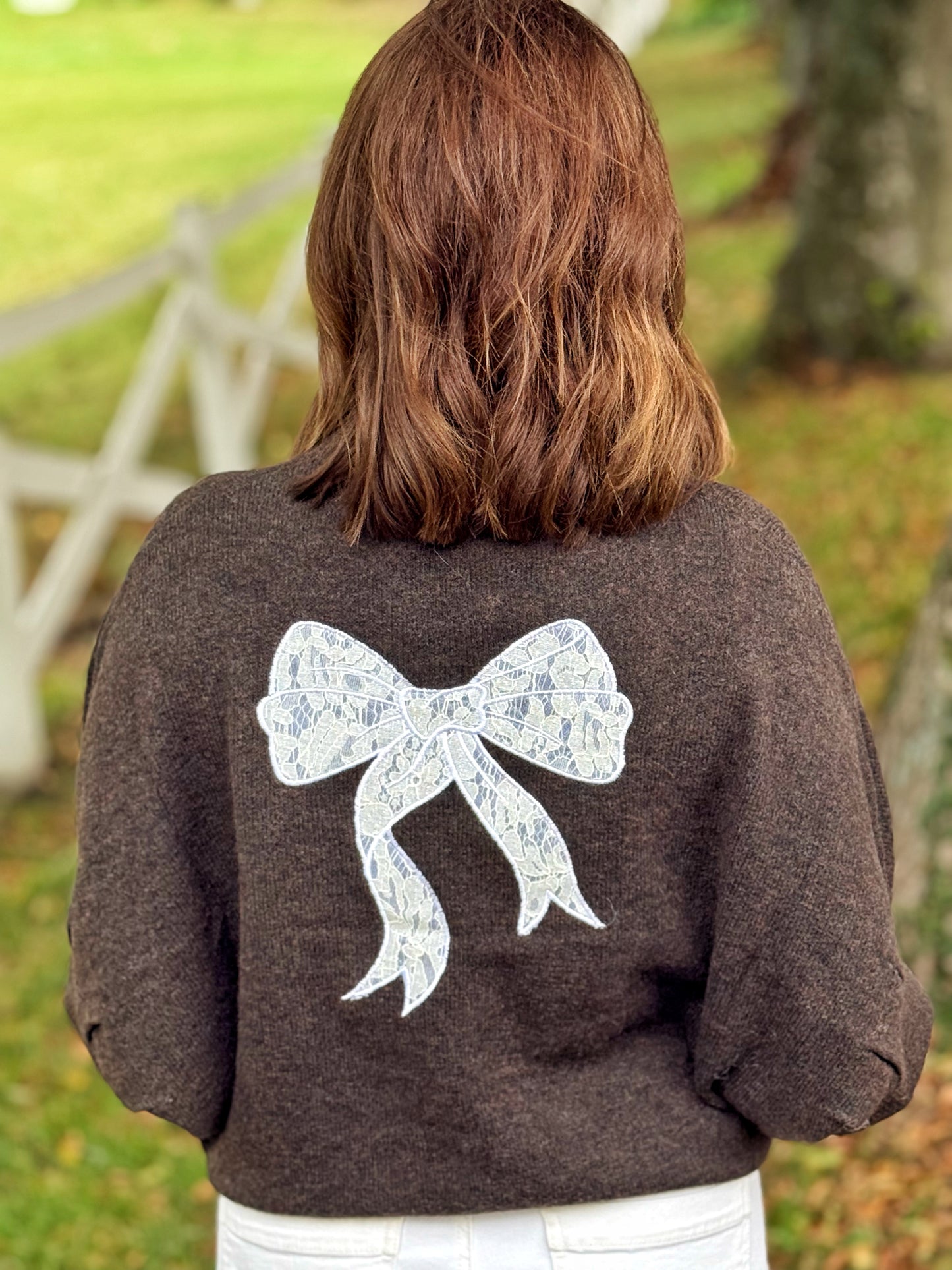 Kuschelpullover mit Schleife - Schokobraun